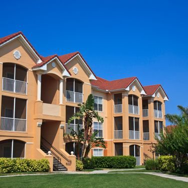 Orange Apartments with Grass